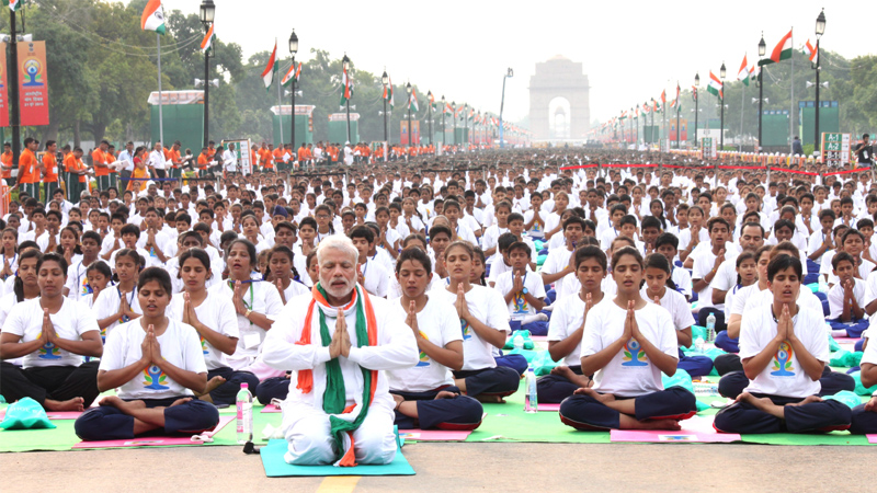 Prime Minister Narendra Modi participates in the mass yoga demonstration at Rajpath on the occasion of International Yoga Day1