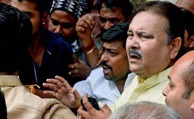 Minister Madan Mitra