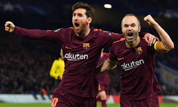 Lionel Messi celebrates with Andrés Iniesta after the Argentinian scored Barcelona’s equaliser at Stamford Bridge