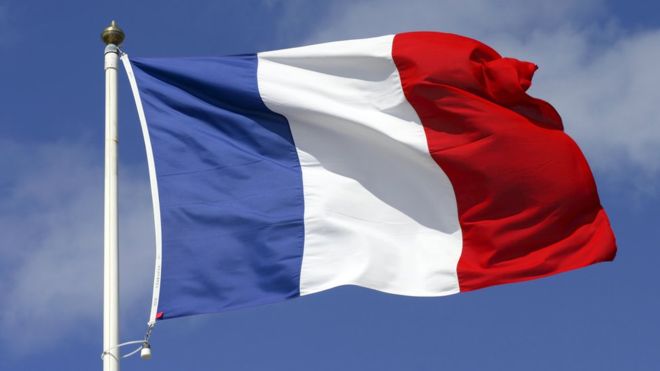 why are schools in France to display flags in classrooms