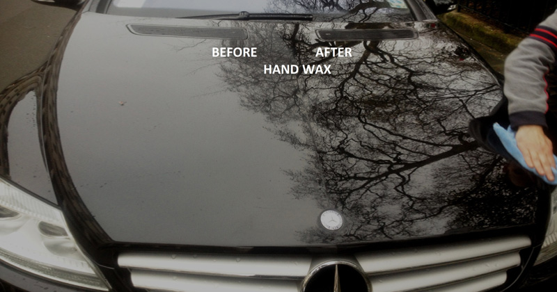 Hand deals polish car